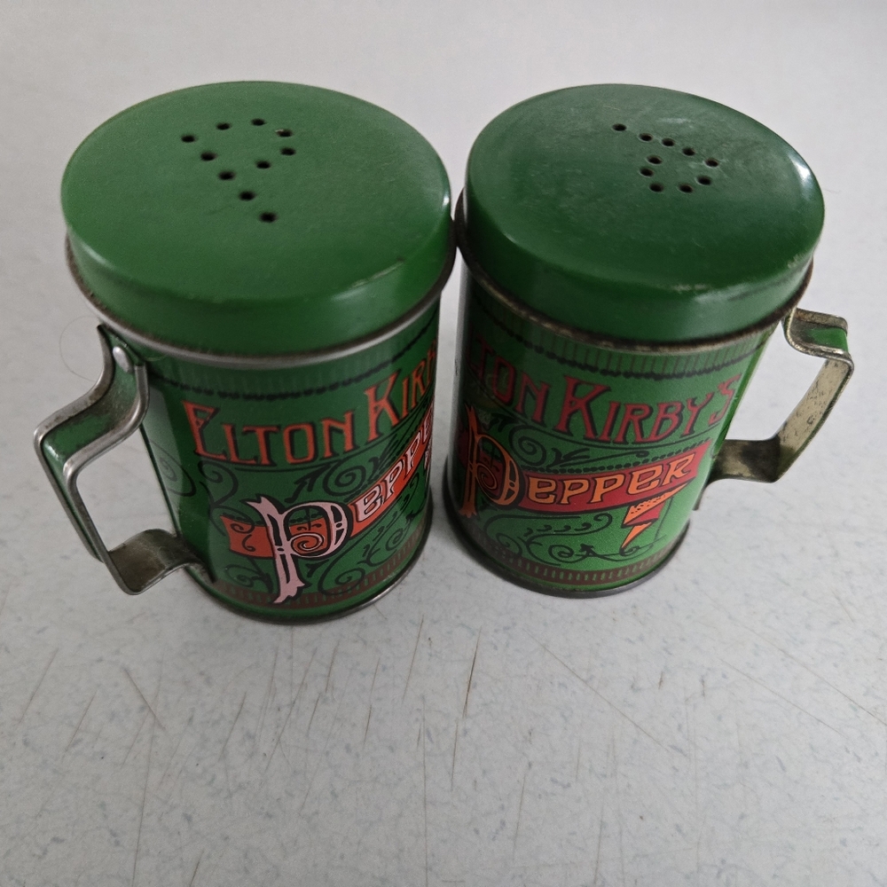 Elton Kirby's tin Pepper Shakers Vtg